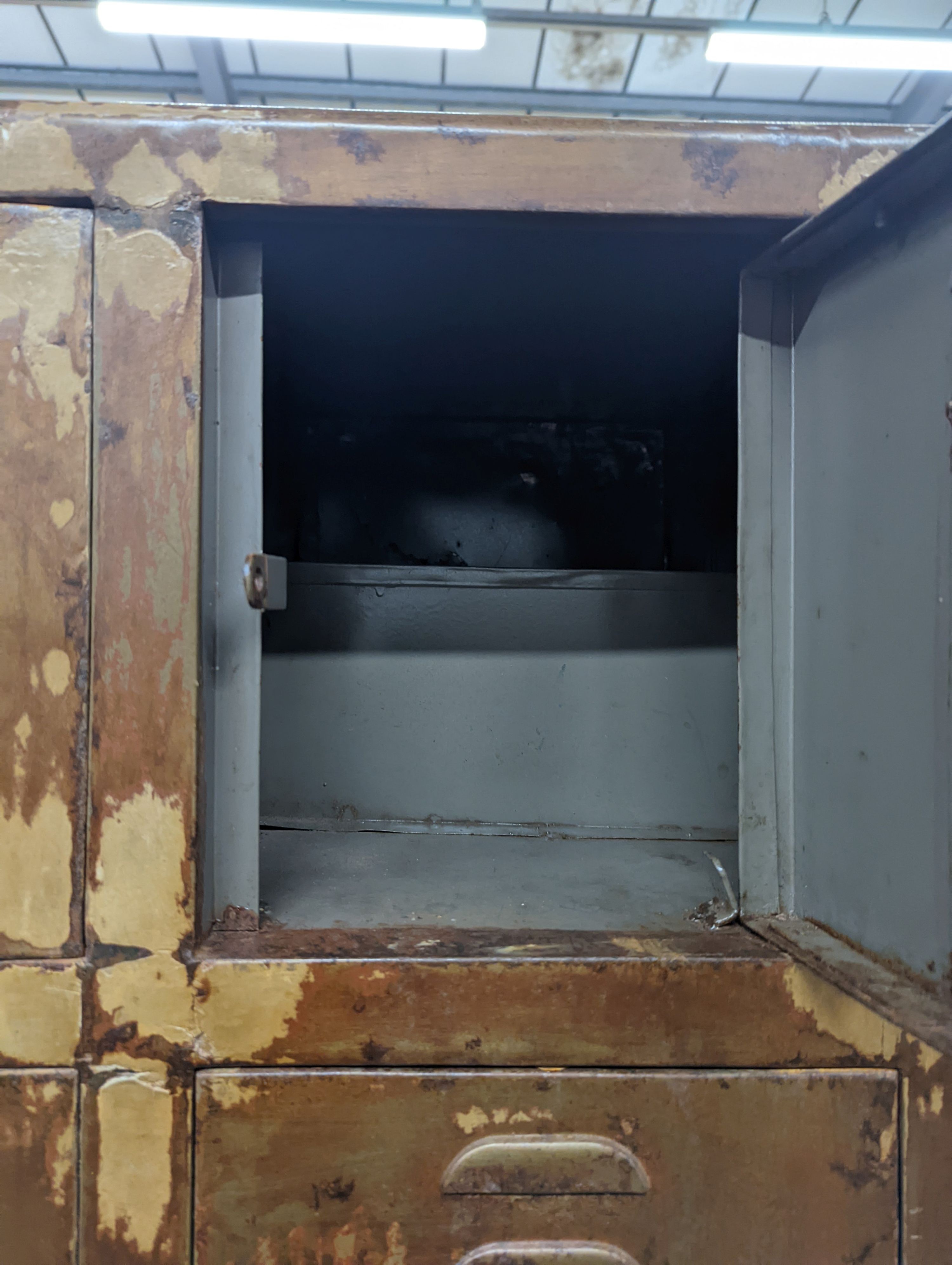 An industrial style metal locker unit. W-91cm, D-49cm, H-198cm.